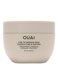OUAI hårbehandlingmaske i en glatt, kremfarget krukke. Har et minimalistisk design; merket for fint til middels hår. Kapasitet på 8 fl oz.