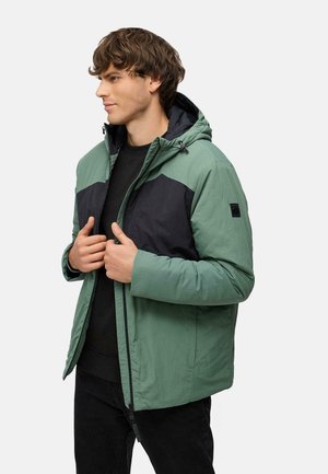 Zweifarbige grüne und schwarze Zip-Jacke mit Kapuze, aus leichtem Material, mit vorderen Taschen und einer verstellbaren Kapuze mit Kordelzügen.