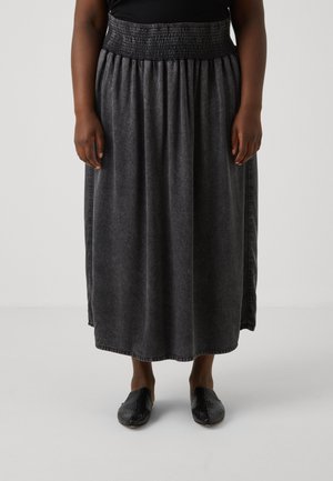 Saia longa de tom cinza escuro, feita de um tecido suave, com uma cintura franzida. A saia apresenta um design simples e fluído, com uma bainha reta.