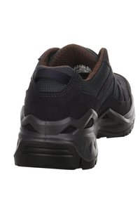 Dark blue athletic shoes with a suede and mesh upper, textured heel, and a thick black rubber sole featuring zigzag patterns.