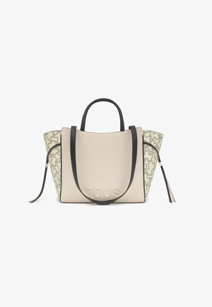 Borsa beige con manici neri, design strutturato e pannelli laterali in crema testurizzati con un motivo sottile. Logo "TOUS" impresso sul davanti.