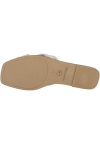 Suela de zapato para mujer Tamaris, color beige plano con patrón texturizado, con el logotipo grabado "ANTI SLIDE", talla 38. Bordes suaves, material duradero.
