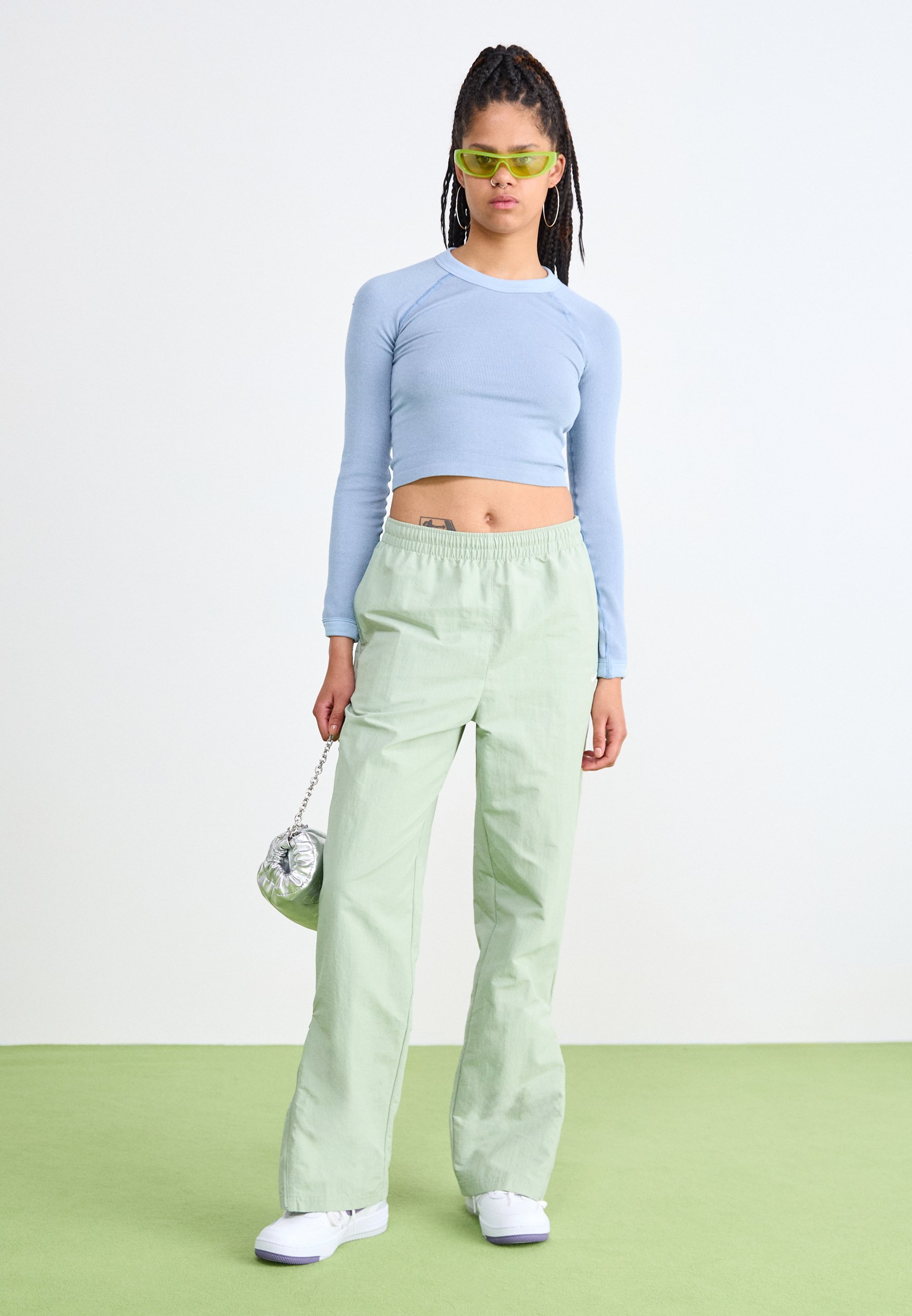 nike women's cropped tracksuit