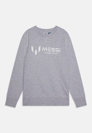 Sivi dukserica dugih rukava s bijelim logotipom na kojem piše "MESSi TRAINING SYSTEM" na prsima. Izrađena od mekanog materijala.