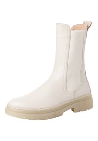 Bottine blanche en cuir avec des panneaux élastiques sur les côtés, bout arrondi et une semelle épaisse en caoutchouc translucide. Détails de couture minimalistes.