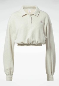 Cropped light beige polo sweatshirt with a collar, button placket, and elasticized cuffs. Soft texture with a simple design.