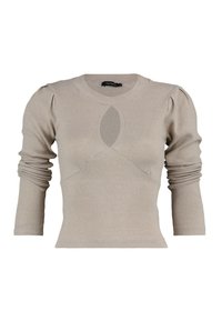 Haut beige côtelé à manches longues avec un col rond, des manches subtilement bouffantes et une découpe clé au centre. Texture en maille douce.