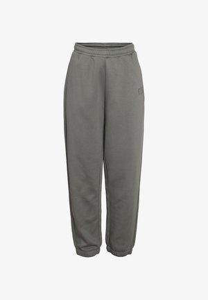 Grå joggebukser laget av mykt stoff, med elastisk linning, ribbede mansjetter, sidelommer og en diskret logodetalj på låret.