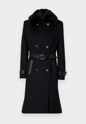 Juodas dvigubos krūtinės paltas su dirbtinio kailio apykakle, odiniais akcentais ir diržu su apvaliu sagtimi. Pagamintas iš tekstūruotos medžiagos.