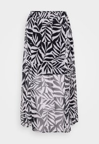 Black and white sheer skirt featuring a leaf pattern, elastic waistband, and a layered design with varying opacity and flowy texture.