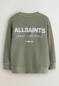Felpa verde, strutturata, con colletto a girocollo. Presenta testo ricamato in bianco: "ALLSAINTS," "LONDON," e ulteriore testo in giapponese.