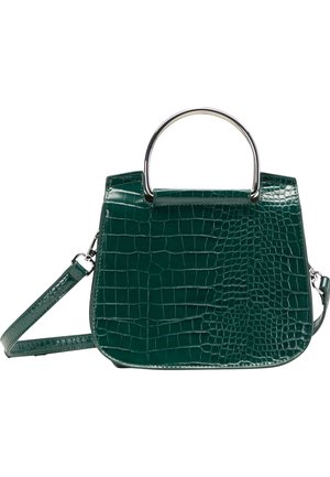 Sac à main en simili cuir crocodile vert avec anse circulaire en métal argenté, bandoulière réglable, forme structurée et surface texturée.