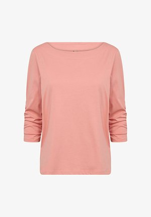 Pink cotton long-sleeve shirt with a rounded neckline and gathered sleeves, featuring a soft, smooth texture and relaxed fit.