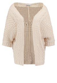 Cardigan beige en grosse maille avec manches courtes, devant ouvert et motifs texturés variés sur tout le tissu.
