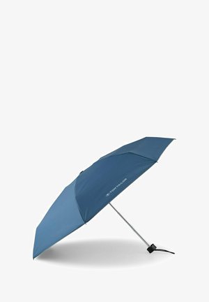 Blue compact foldable umbrella with metal shaft and black handle lying open on a white background, branded "Tom Tailor".