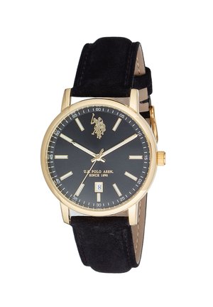 Orologio da polso con cassa dorata, quadrante nero, indici delle ore dorati, datario alle 6, cinturino in pelle nera e logo U.S. Polo Assn. alle 12.