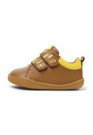 Brown leather shoe with yellow accents, two Velcro straps, rounded toe, and textured sole for grip. Back loop for easy wearing.