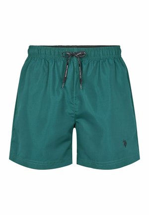 Zelené plavky vyrobené z hladké látky, s elastickým pasem a šňůrkou, a malým logem na spodní straně.