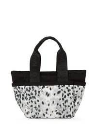 Black and white tote bag made of fabric with a spotted pattern, featuring dual black fabric handles and a contrasting solid black trim.