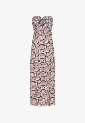 Maxi sukienka bez ramiączek w odcieniu brzoskwiniowym z wzorem w czarne i białe spirale. Posiada marszczoną górę oraz dekoracyjny kamień na środku.