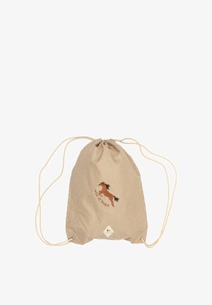 Sac en toile beige à cordon, fabriqué à partir de tissu texturé, avec un cheval brun brodé et la phrase "wild at heart" dans un design circulaire.