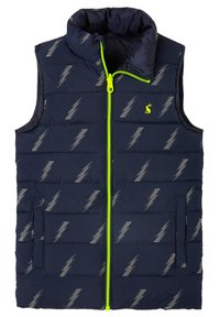 Laivastonsininen puffervesti, jossa on harmaa salama-kuvio, korkea kaulus, vetoketjukiinnitys neonvihreällä vetoketjulla ja kaksi sivutaskua.