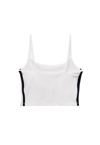 Hvid crop top med tynde stropper, der har et ensartet design og marineblå sidedele. Fremstillet af et blødt, strækbart materiale.