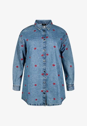 Denim shirt in light blue with long sleeves, featuring red embroidered lips, button-down front, and classic collar detailing.