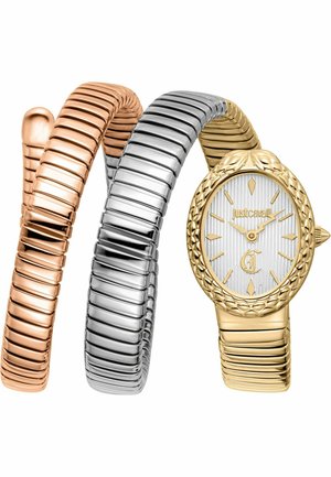 Orologio da polso Just Cavalli ovale in oro con lunetta testurizzata, quadrante bianco, indici dorati e cinturino a spirale multimetallo nei toni dell'oro, argento e rosa.