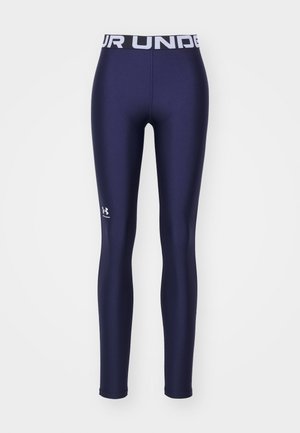 Leggings atléticos em azul-marinho com uma textura suave, uma cintura alta com um logótipo branco e um emblema da marca na parte inferior da perna.
