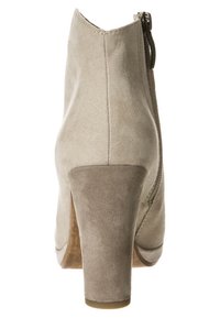 Beige suede ankle boot with a rounded toe, high block heel, and zip closure on the back. Textured surface and smooth heel accent.