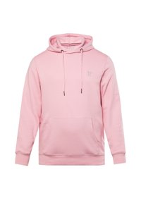 Sudadera rosa claro hecha de un tejido suave, con un bolsillo frontal tipo canguro, cordones y un logotipo en relieve en el pecho.