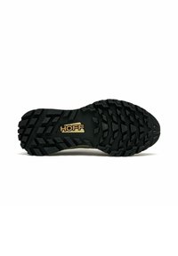 Suela de zapato de goma negra con profundas ranuras, patrones texturizados y un prominente logo dorado "HOff". Diseñada para proporcionar tracción y durabilidad.