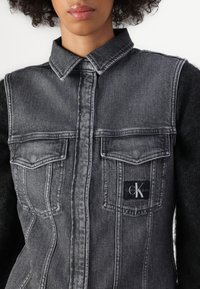 Calvin Klein Jeans SLEEVELESS LEAN SHIRT - Top - denim grey