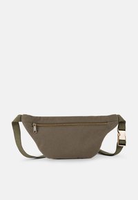 Olive green fabric fanny pack with a curved design, features a front zipper pocket, adjustable strap, and gold-toned hardware accents.