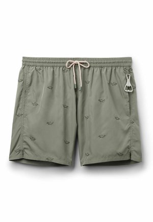 Lichtgroene zwembroek met kleine zwarte haai prints, elastische tailleband, witte aantrekkoord, zijzakken en een metalen flesopener bevestigd.