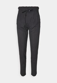 Svartvita randiga byxor med resårmidja och dragsko, med sidofickor och en avsmalnande passform.