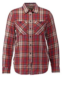 Camicia button-up a quadri rossi e crema con due tasche frontali, colletto a punta e maniche lunghe. Tessuto misto cotone con una consistenza morbida.