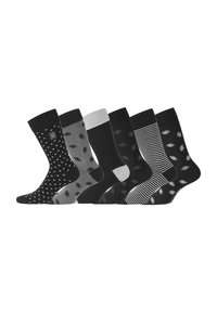 Six paires de chaussettes de type crew en noir et gris avec des motifs variés : pois, feuilles et rayures ; textures mises en évidence et bandes contrastantes.