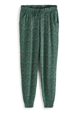 Pantalon vert fuselé avec petit imprimé floral, taille élastique avec cordon et poches latérales, présenté sur fond blanc.