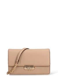 Beige leather handbag with gold hardware, featuring a front flap, chain accent strap, and a smooth texture. Compact rectangular shape.