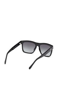 Guess Solglasögon - glossy black smoke gray