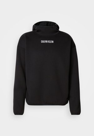 Zwarte sweatshirt met een hoge hals, lange mouwen en geribbelde manchetten. "CALVIN KLEIN" logo in het wit op de bovenrug. Zacht textuur van de stof.