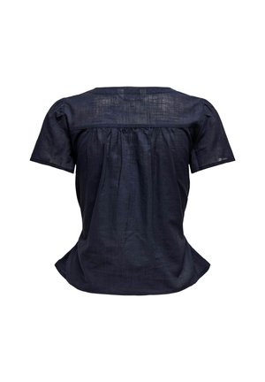 Dark navy linen blouse with short sleeves, pleated back detail, and a rounded neckline. Soft texture and relaxed fit with curved hemline.