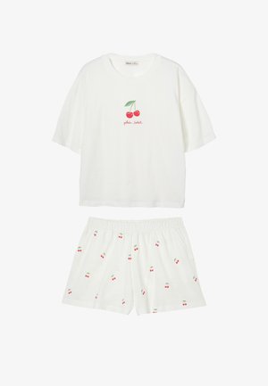 White short-sleeve top and shorts set with red cherry patterns; top features two cherries and red text "plein Soleil" on chest.