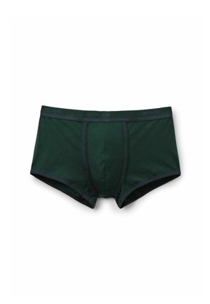 Donkergroene boxershort gemaakt van zachte katoen, met een zwarte elastische tailleband voorzien van de tekst "HUMAN" en contrasterende stiksels.