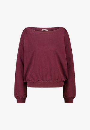 Sudadera de manga larga color granate con cuello ancho y puños y dobladillo elásticos, con la etiqueta "America Today" en el interior del cuello.