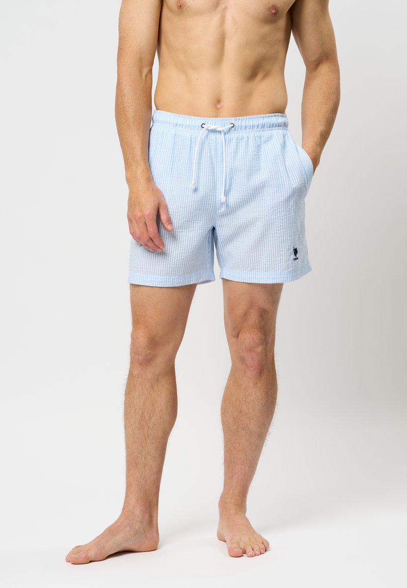 Modre in bele prugaste kopalne hlače z elastičnim pasom, zavezovanjem na vrvico, stranskima žepoma in izvezenim logotipom.