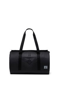 Borsa duffel nera con doppi manici superiori, chiusura con zip, superficie liscia, forma rettangolare e un patch con logo a forma di diamante sul davanti.