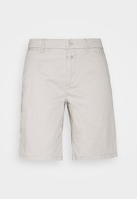 Shorts beige en coton, avec une fermeture à bouton, une poche avant unique et un ourlet cousu. Coupe droite, longueur mi-cuisse.